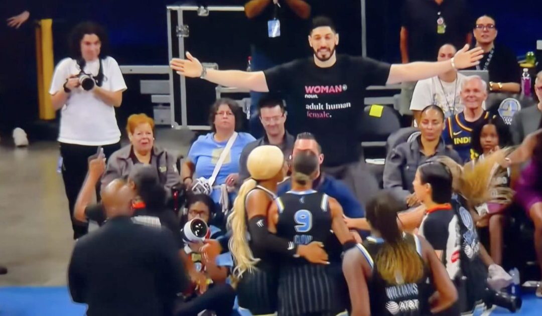 OUTRAGE: Enes Kanter Freedom Escorted Out of WNBA Game After Chicago Sky Guard Melts Down in Furious Tirade Over His “Woman: Adult Human Female” Shirt (VIDEO)