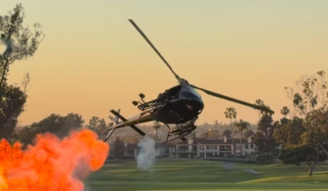 Watch: Stunt Chopper at Navy SEAL Fundraiser Thrills Guests With Small Explosions and Red, White and Blue Smoke Show
