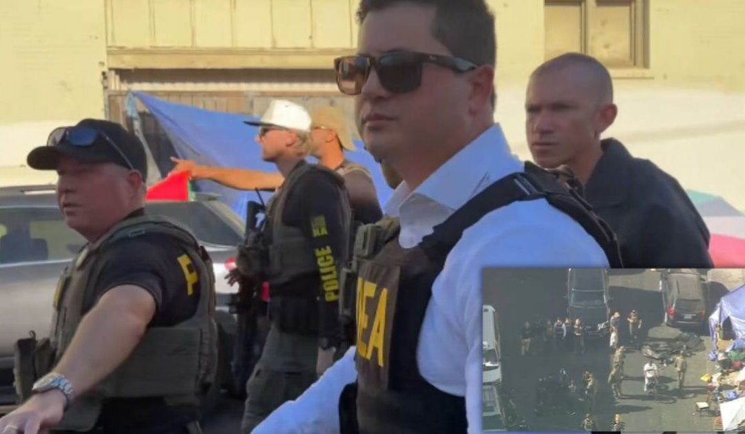 WATCH: Feds Storm Skid Row with a 100-Vehicle Convoy to Take Down Drug Network Operating in Tents and Storefronts